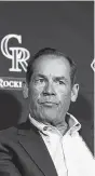 ?? AAron Ontiveroz, The Denver Post ?? Rockies owner Dick Monfort, above, and general manager Jeff Bridich have both said that the club is on a tight budget for 2021.