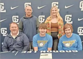  ?? Scott herpst ?? Kevin, Kelley and Kalyn Dodson, along with Gordon Lee head football coach Josh Groce, were among the crowd gathered this past Wednesday to watch senior Nolan Dodson sign on to play sprint football at Midway University in Kentucky.
