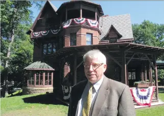  ?? DAVE COLLINS/THE ASSOCIATED PRESS ?? Pieter Roos, new executive director of the Mark Twain House and Museum, at the historic home in Hartford, Conn., where the humorist wrote Huckleberr­y Finn and other classics.