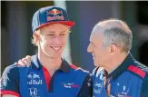  ?? GETTY IMAGES ?? Brendon Hartley, left, with Toro Rosso boss Franz Tost.