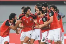  ??  ?? The Egyptian national team qualified to the World Cup after defeating the Democratic Republic of Congo