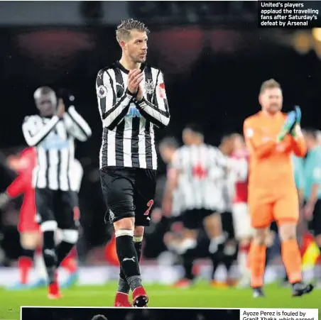  ??  ?? United’s players applaud the travelling fans after Saturday’s defeat by Arsenal