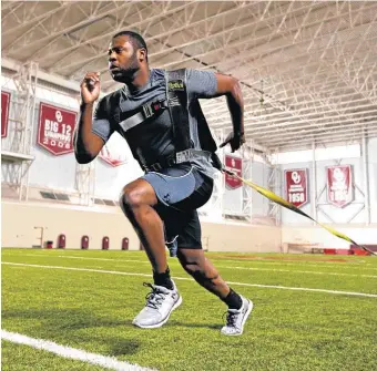  ?? [PHOTO BY STEVE SISNEY, THE OKLAHOMAN] ?? Kansas City Royals outfielder Lorenzo Cain has spent his offseason working out at the University of Oklahoma’s Everest Indoor Practice Facility.