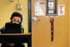  ?? Kin Man Hui / Staff file photo ?? Third grader Austin Byrom takes part in a class lesson at Pearce Elementary School in Southside ISD in December.