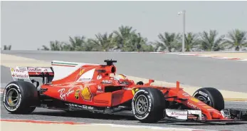  ?? FOTO: DPA ?? Sebastian Vettel im Ferrari während des Trainings in Bahrain.