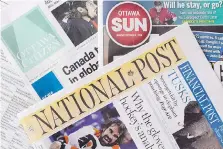  ?? JUSTIN TANG/THE CANADIAN PRESS/FILES ?? Postmedia plans to close unprofitab­le titles and cut salary expenses by 10 per cent by Aug. 31.