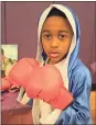  ?? Kristina Wilder / RN-T ?? Myles Twyman poses as Muhammad Ali during the Darlington Wax Museum.