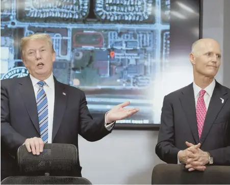  ?? AP PHOTO ?? ‘NOT ACCEPTABLE’: President Trump, left, and Florida Gov. Rick Scott both have criticized the FBI for failing to prevent Wednesday’s mass shooting in Florida. The gunman was reported to the FBI in January.