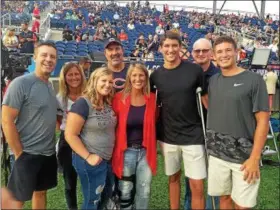  ?? JOHN KAMPF - THE NEWS-HERALD ?? The Trubisky family takes in the scene before the Hall of Fame game on Aug. 2, 2018.