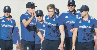  ??  ?? England players celebrate a wicket in yesterday’s win