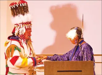  ?? Photo submitted ?? Piikani Nation Chief Stan Grier, left, takes part in a ceremony at the annual Rocky Mountain Tribal Leaders Council in Billings, Mont.