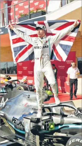  ?? AP ?? Lewis Hamilton celebrates after clinching his sixth world title in Austin, Texas, on Sunday.