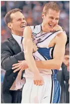  ?? | GETTY IMAGES ?? Associate head coach Chris Collins and Jon Scheyer celebrate Duke’s victory against Butler in the 2010 NCAA title game.