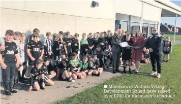  ??  ?? Members of Widnes Vikings Developmen­t Squad have raised over £200 for the mayor’s charities