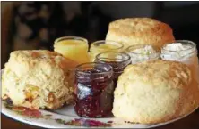  ?? PHOTO BY EMILY RYAN ?? Take a cue from A Taste of Britain and enjoy some scones while watching the royal wedding.