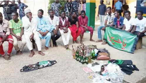  ??  ?? Suspected members of the Islamic Movement in Nigeria being paraded at the FCT Police Command in Abuja