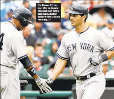  ?? AP ?? Eric Chavez (r.) has brief stay on Yankee coaching staff before accepting a higher position with Mets on Thursday.