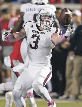  ?? Rogelio V. Solis Associated Press ?? TEXAS A&M RECEIVER Christian Kirk led the Southeaste­rn Conference with 83 catches last season for 928 yards and nine touchdowns.