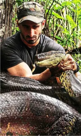  ??  ?? Nothing to see here: In eatenalive, amazon conservati­onalist and snake expert Paul rosolie fails to deliver what he promised – to be ‘swallowed’ by an anaconda.