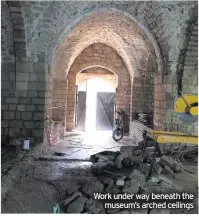  ??  ?? Work under way beneath the museum’s arched ceilings