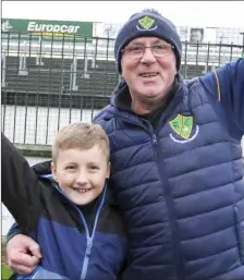  ??  ?? Paul Merrigan celebratin­g with his grandson Ben Clifford after Rathgarogu­e Cushinstow­n beat Blackhill Emeralds in the All Ireland junior club championsh­ip semi-final at Newbridge.