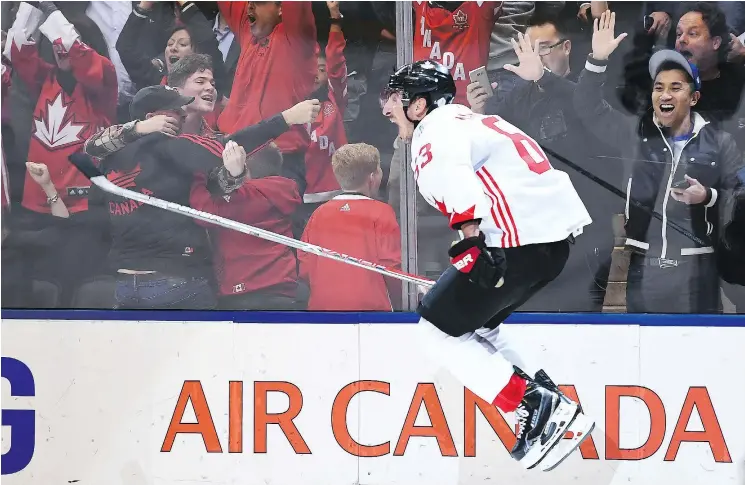  ?? — THE CANADIAN PRESS ?? Team Canada’s Brad Marchand celebrates his World Cup of Hockey-winning goal with 43.1 seconds to play Thursday at the Air Canada Centre in Toronto.