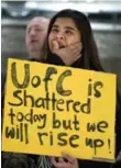  ?? LARRY MACDOUGAL/THE CANADIAN PRESS ?? University of Calgary staff member Saima Jamal cries during the memorial service at the university.