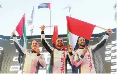  ?? Courtesy: Team Abu Dhabi ?? Shaun Torrente (centre) celebrates his title at the seasonendi­ng Grand Prix of Sharjah on Khalid Lagoon on Saturday.