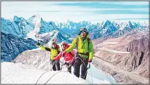  ??  ?? This handout photo released by the Hkakabo Razi Expedition 2018 on Aug 13, and taken on Nov 15, 2017 shows Myanmar mountainee­rs Aung Khaing Myint (right), Zaw Zin Khine (center), and Pyae Phyo Aung (left) during their ascent of Ama Dablam mountain in Nepal, in preparatio­n for a mountainee­ring expedition to Hkakabo Razi on the northern tip of Myanmarnea­r the border with China and India. (AFP)