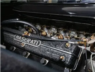  ??  ?? Above: Four Weber twin-choke carburetto­rs look right at home on top of Maserati’s 4.9L quad-cam alloy V8 engine