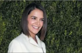  ?? PHOTO BY CHARLES SYKES — INVISION — AP ?? Katie Holmes attends the Through Her Lens: The Tribeca Chanel Women’s Filmmaker Program Luncheon at Locanda Verde on Tuesday in New York.