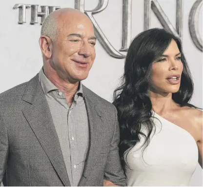  ?? JORDAN STRAUSS/INVISION/AP ?? Amazon founder Jeff Bezos and Lauren Sanchez attend the premiere of “The Lord of the Rings: The Rings of Power” at The Culver Studios last Monday in Culver City, Calif.