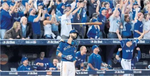  ?? CHRIS YOUNG THE CANADIAN PRESS FILE PHOTO ?? Former Blue Jay Jose Bautista flips his bat after hitting a decisive three-run home run against the Rangers in Game 5 of an epic 2015 American League Division Series.