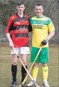  ?? Photograph: Donald Cameron. ?? Like father - like son . . . both shinty players but playing on opposite sides last Saturday in a North Division 1 fixture. Glenurquha­rt’s Cameron Bremner was playing against his father Scott who plays for Glengarry. On this occasion it was dad Scott...