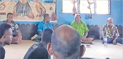  ?? Picture: LITIA CAVA ?? Minister for Forestry Osea Naiqamu (third from left) is entertaine­d by the Kabu kei Naqalotu band. sigidrigi