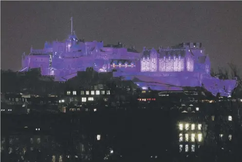  ?? PICTURE: NEIL HANNA ?? 0 Edinburgh Castle will now be lit up purple to mark neurodiver­sity after the backlash on Twitter