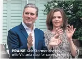  ??  ?? PRAISE Keir Starmer and his wife Victoria clap for carers in April