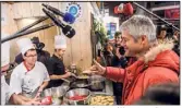  ?? (Photo EPA) ?? Toujours vêtu de rouge lorsqu’il est sur le terrain, Laurent Wauquiez à fait, hier, la tournée des stands au Salon de l’agricultur­e.