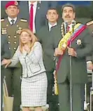  ?? Photo / AP ?? First lady Cilia Flores is startled by an explosion as President Nicola´s Maduro speaks.