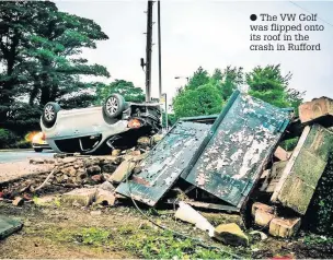  ??  ?? The VW Golf was flipped onto its roof in the crash in Rufford