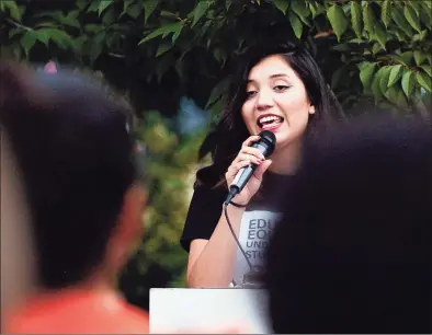  ?? Hearst Connecticu­t Media file photo ?? Angelica Idrovo of Danbury, then a student at UConn Stamford speaks to activists from Fairfield County communitie­s gathered in Mill River Park, in 2017. The group was protesting then President Donald Trump’s decision on the future of Deferred Action for Childhood Arrivals.