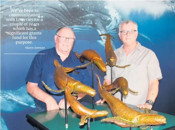  ?? PHOTO / ROSALIE WILLIS ?? Whale Song Charitable Trust members Barry Clevely, left, and Marco Zeeman with a small scale rough version of what a life-size whale sculpture will look like.