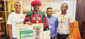  ?? ?? L-R: Head of Human Resources, AAJ Group, Adelanfe Osinloye; CEO, Amb. Adeyemo Adekunle; Business Developmen­t Manager, AAJ Express Logistics, Oluwaseni Olufeso and Head Accountant AAJ Group, Segun Adeoti as Adeyemo receives the Nelson Mandela Leadership Award of Excellence and Integrity by the West Africa Youth Council in Lagos ... recently