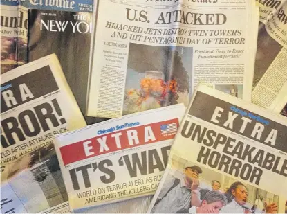  ?? NEIL STEINBERG/SUN-TIMES ?? Newspapers and magazines from the Sept. 11, 2001, attacks, including three “EXTRA” editions of the Sun-Times.