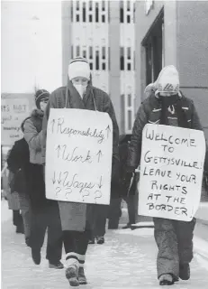  ?? FILE/POSTMEDIA ?? Nurses protest outside former premier Don Getty’s Calgary office during a provincewi­de illegal strike in 1988.