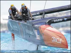  ?? CLIVE MASON / GETTY IMAGES ?? Oracle Team USA could not salvage a split in Saturday’s competitio­n, as its catamaran faltered in the second race against Team New Zealand.