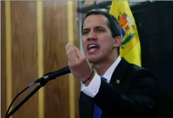  ??  ?? Venezuela’s opposition leader and self-proclaimed interim president Juan Guaidó speaks during a meeting with the Chamber of Commerce, in Caracas, Venezuela, on Thursday. AP Photo/FernAndo LLAno