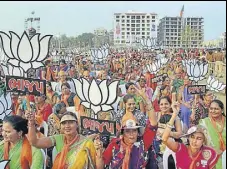  ?? PTI PHOTO ?? BJP supporters during PM Narendra Modi's rally at Nikol in Ahmedabad on Friday.