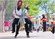  ?? MARLA BROSE/JOURNAL ?? Ritual Matachines dancers perform during a recent Fiestas de San Lorenzo in the town of Bernalillo. This year’s fiesta will be held Aug. 9-11.