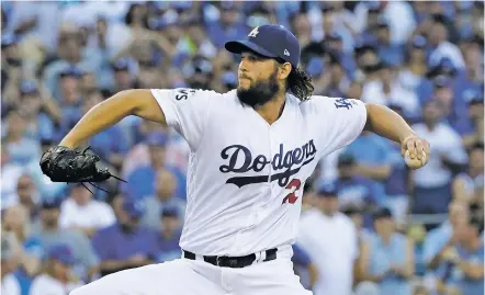  ?? DAVID J. PHILLIP/THE ASSOCIATED PRESS ?? Dodgers starting pitcher Clayton Kershaw throws during the first inning of Game 1 of the World Series against the Astros on Tuesday in Los Angeles. Kershaw winner struck out 11, gave up three hits and walked none over seven innings.